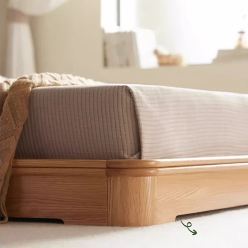 oak-platform-bed-tufted-headboard-lifestyle-scene Oak platform bed with tufted cushion headboard in a soft lifestyle scene