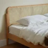 Oak rattan cane headboard weave closeup detail showing handcrafted texture