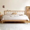 Oak spindle headboard bed front view showing vertical slat design