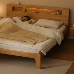 Ash wood platform bed with LED headboard shelf in a warm master bedroom scene