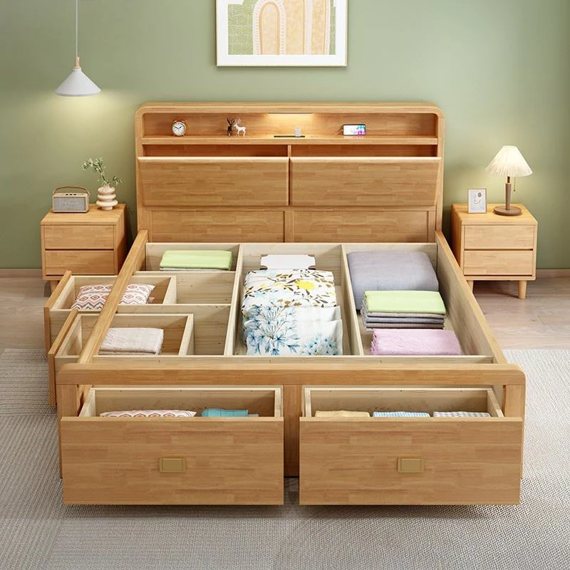 Solid oak storage bed with gas lift drawers open in a styled bedroom