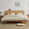 Solid oak platform bed frame with rounded headboard front view