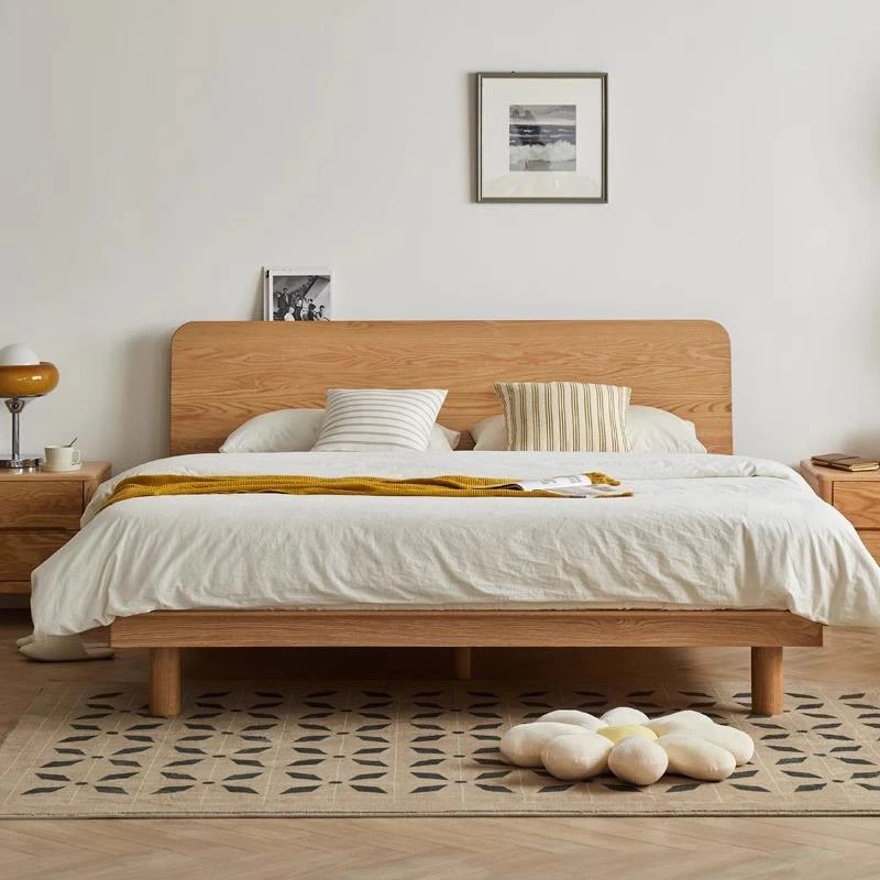 Solid oak platform bed frame with rounded headboard front view