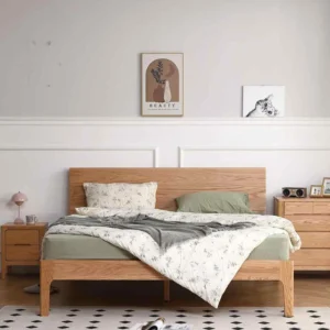 solid-oak-platform-bed-front-view-bedroom Solid oak platform bed shown from the front in a bright bedroom setting