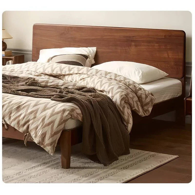 solid-walnut-platform-bed-frame-master-bedroom Solid walnut platform bed frame with rounded headboard in an elegant master bedroom