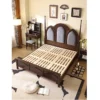 Vintage poster bed slatted base view showing solid wood frame structure
