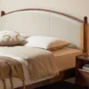 walnut-bed-frame-210cm-length-side-view Black walnut bed frame with arched upholstered headboard in a warm bedroom scene