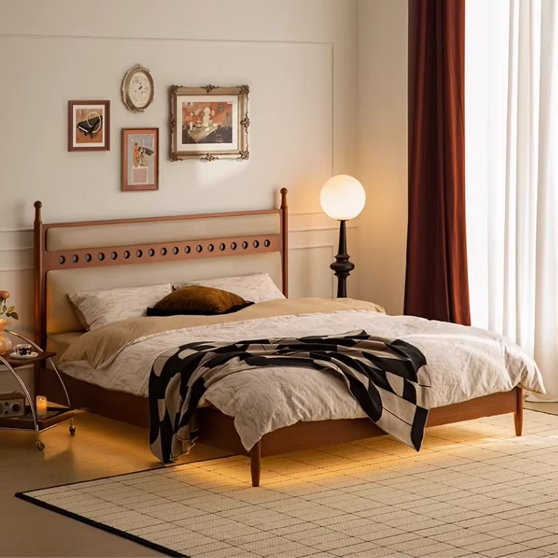 walnut-bed-frame-cream-headboard-lifestyle-scene Walnut bed frame with cream upholstered headboard in a lifestyle bedroom scene