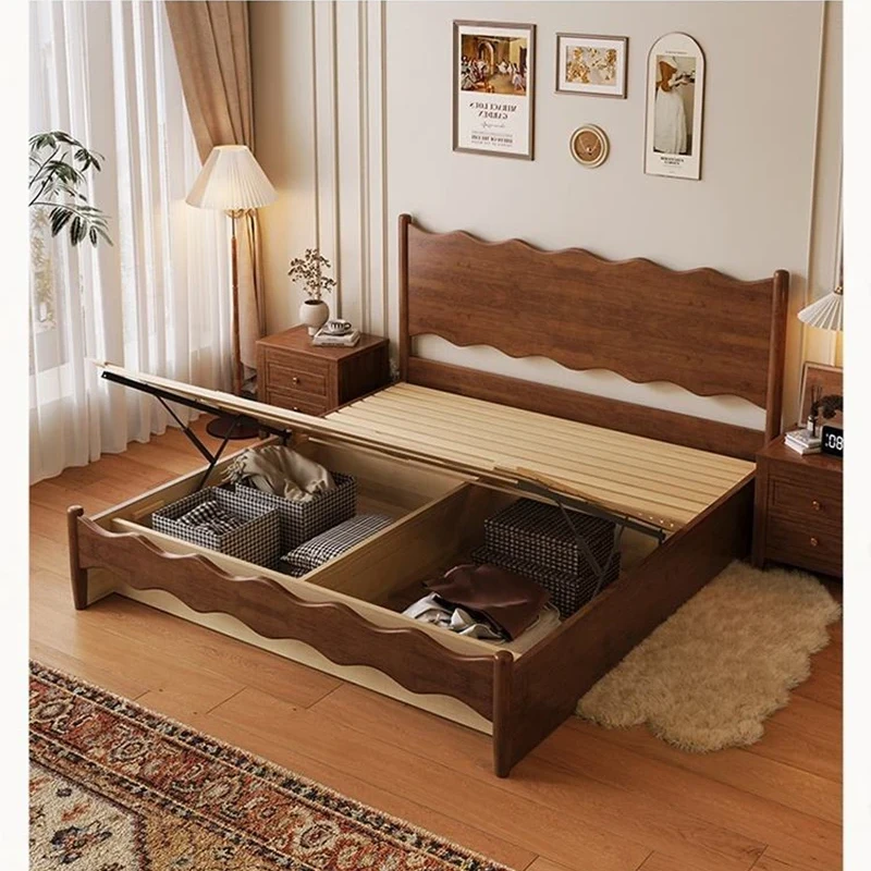 Walnut gas lift storage bed showing large underbed storage space