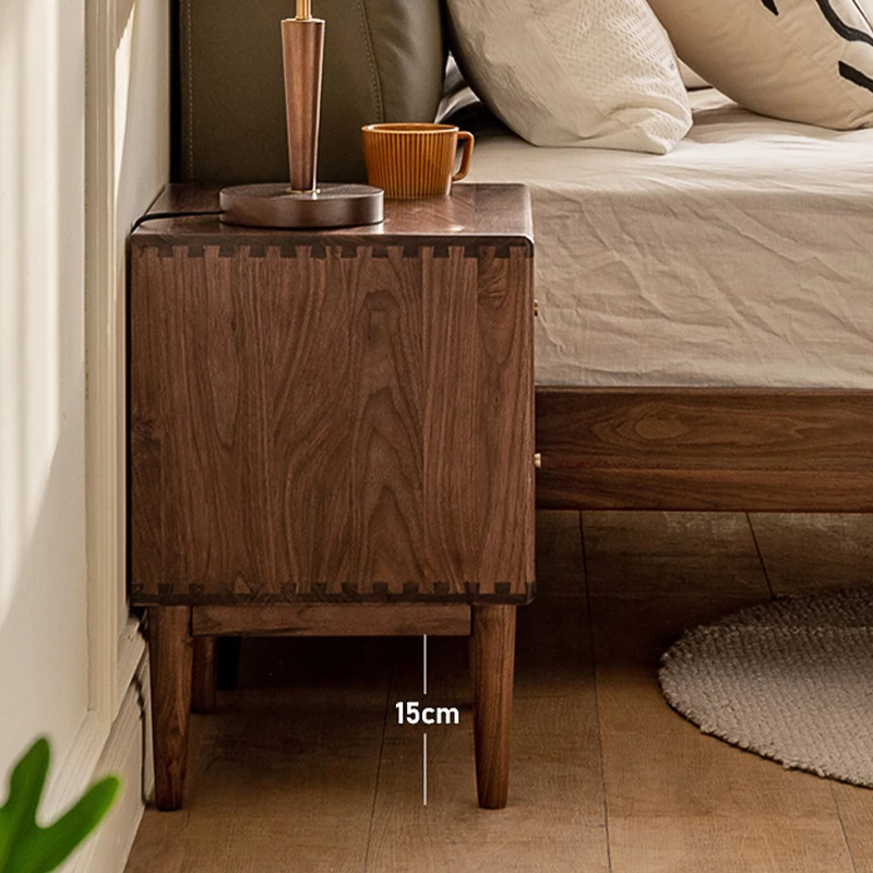 Walnut nightstand with lamp in a cozy bedroom lifestyle scene