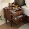 Walnut nightstand with open drawers showing storage dimensions