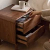 Walnut nightstand rounded leg and wood grain close-up detail