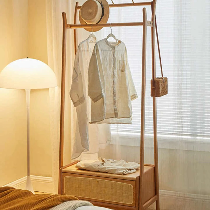 wooden-clothes-rack-bedroom-corner-view Wooden clothes rack bedroom corner view with hat and tote bag
