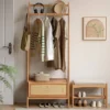 wooden-garment-rack-bedroom-hanging-scene Wooden garment rack with hanging clothes in a bright bedroom scene