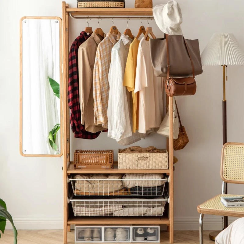 wooden-garment-rack-dimensions-lifestyle-scene Wooden garment rack with clothes mirror and baskets in lifestyle scene